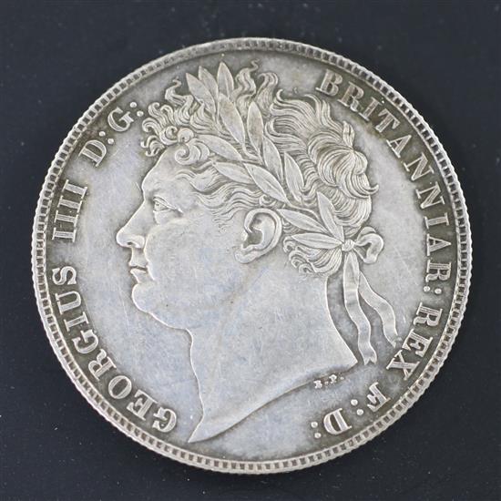 A George IV silver half crown 1821, knock to edge at 11 oclock otherwise EF, toned